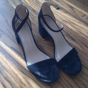 Strappy black heeled sandals